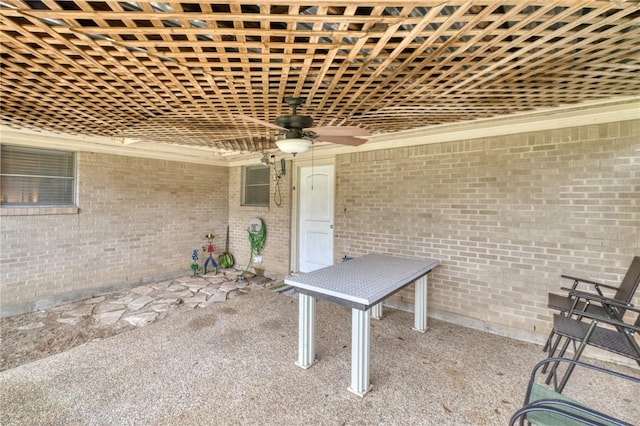 view of patio featuring ceiling fan