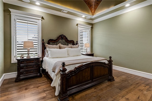 4675 River Garden Ct, Bryan, TX 77808 - bedroom featuring baseboards, lofted ceiling, wood finished floors, multiple windows, and crown molding