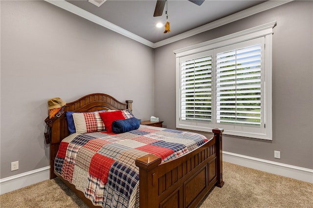 4675 River Garden Ct, Bryan, TX 77808 - bedroom with light colored carpet, ornamental molding, baseboards, and a ceiling fan