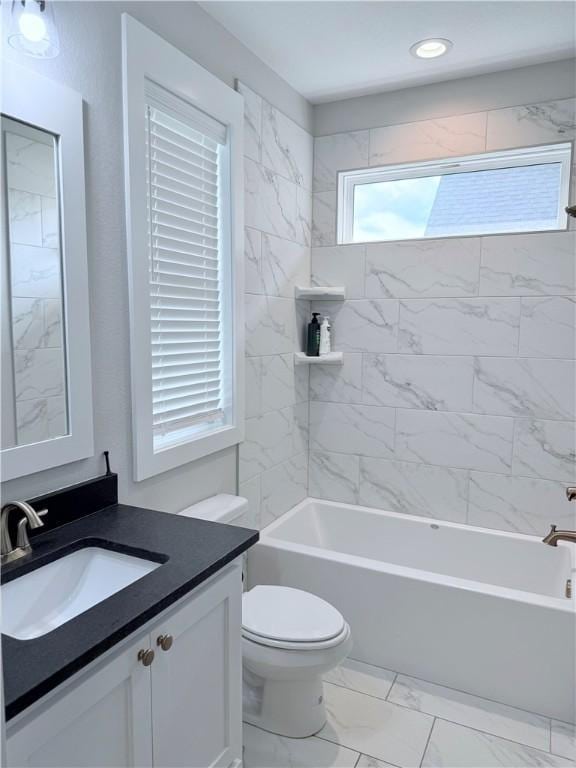 4203 Lismore Ln, College Station, TX 77845 - bathroom featuring vanity, toilet, marble look tile flooring, tub / shower combination, and recessed lighting
