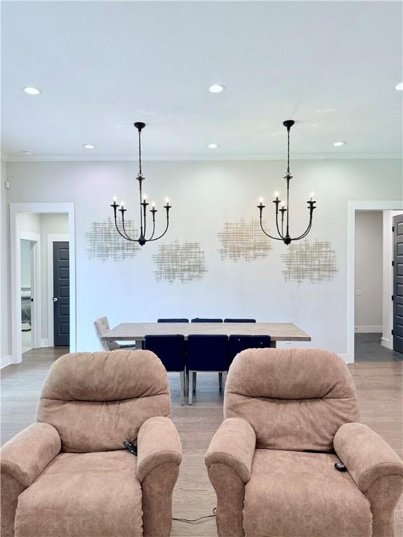 4203 Lismore Ln, College Station, TX 77845 - rec room with a chandelier, recessed lighting, crown molding, baseboards, and light wood-type flooring