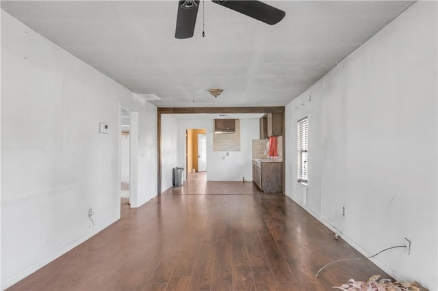 unfurnished room with ceiling fan and wood-type flooring