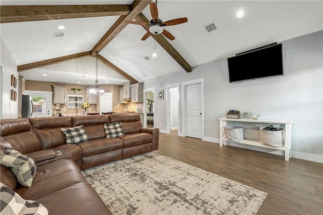 2102 Cary Cir, Bryan, TX 77803 - living area featuring wood finished floors, a ceiling fan, recessed lighting, and a chandelier