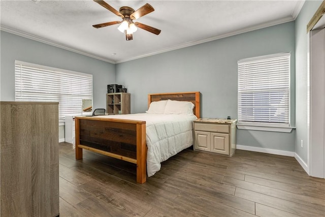 2102 Cary Cir, Bryan, TX 77803 - bedroom featuring crown molding, wood finished floors, and a ceiling fan