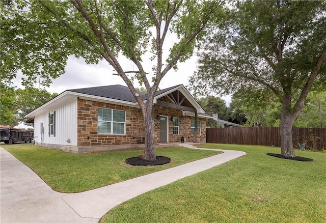 2102 Cary Cir, Bryan, TX 77803 - view of front of home featuring stone siding and board and batten siding