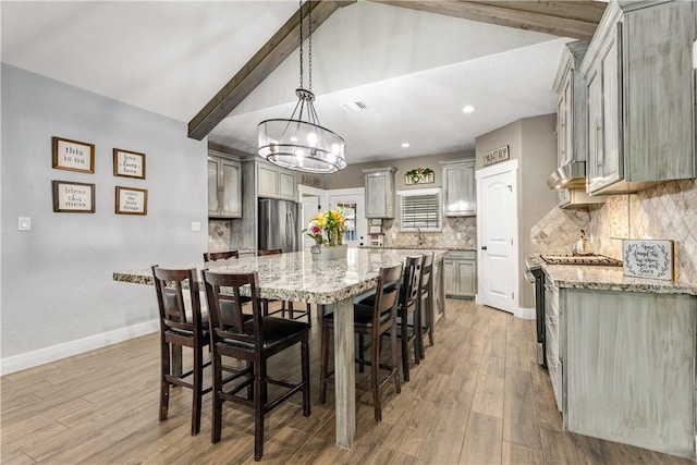 2102 Cary Cir, Bryan, TX 77803 - dining area featuring a chandelier, light wood finished floors, and recessed lighting