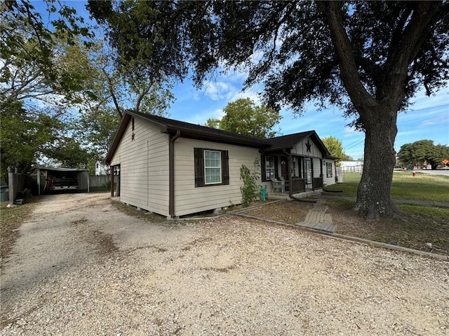 view of front of house featuring a carport