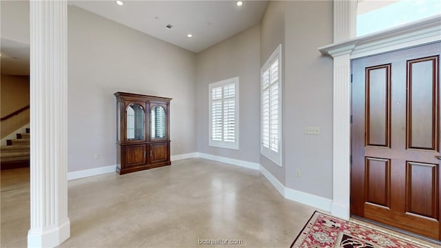 entryway with a high ceiling