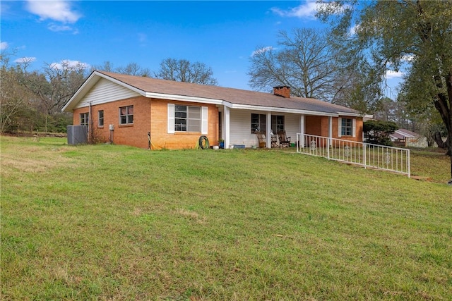 ranch-style house with a front lawn