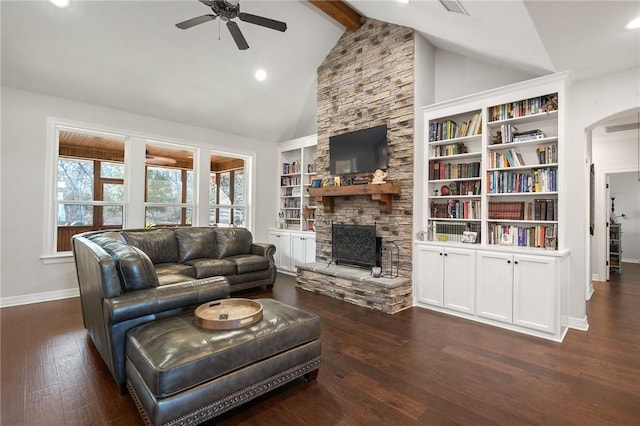 10187 Hampton Ct, Iola, TX 77861 - living area featuring a ceiling fan, a fireplace, baseboards, hardwood / wood-style flooring, and beamed ceiling