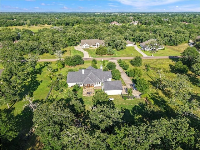 10187 Hampton Ct, Iola, TX 77861 - aerial view of property and surrounding area with a heavily wooded area