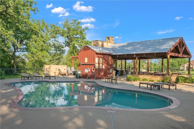 10187 Hampton Ct, Iola, TX 77861 - view of swimming pool featuring a patio and fence