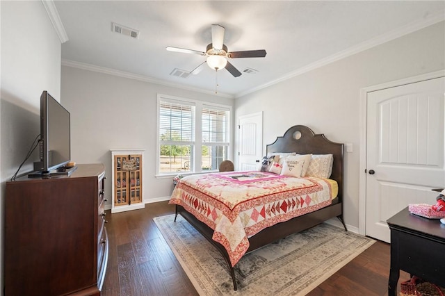 bedroom with dark wood-type flooring, ceiling fan, and crown molding