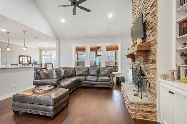 10187 Hampton Ct, Iola, TX 77861 - living area with a ceiling fan, a stone fireplace, dark wood finished floors, high vaulted ceiling, and recessed lighting