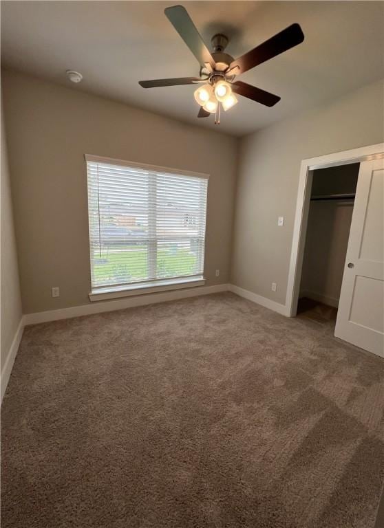 5307 Lyle Pl, Bryan, TX 77807 - unfurnished bedroom with carpet, ceiling fan, and a closet