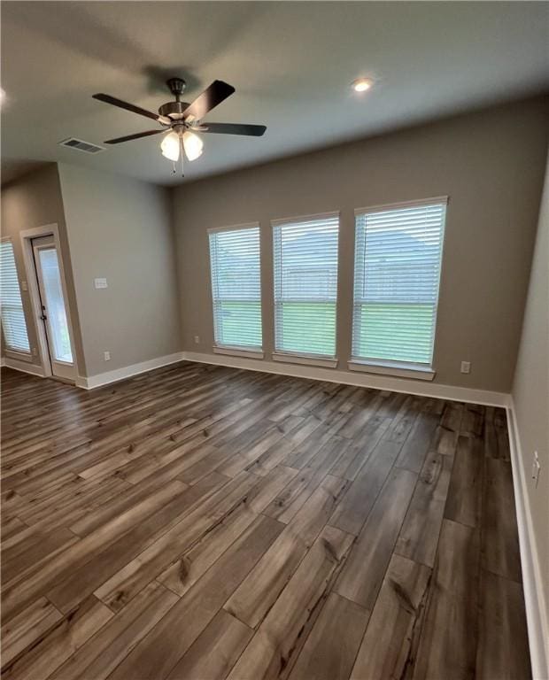 5307 Lyle Pl, Bryan, TX 77807 - spare room featuring dark wood finished floors and ceiling fan