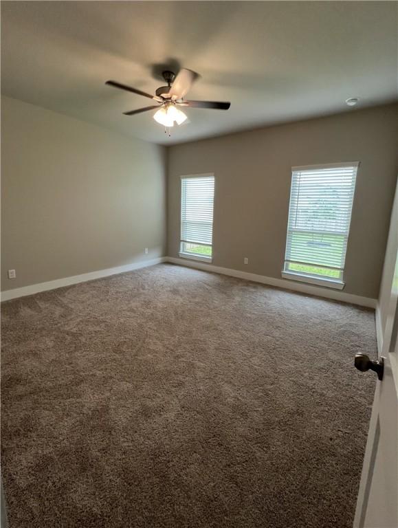 5307 Lyle Pl, Bryan, TX 77807 - carpeted empty room featuring ceiling fan and baseboards