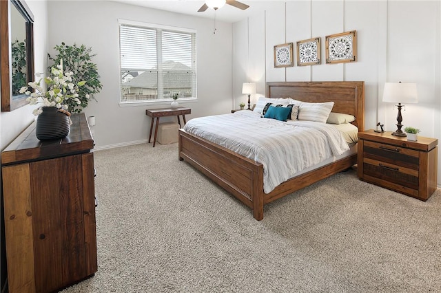 bedroom with light carpet and ceiling fan