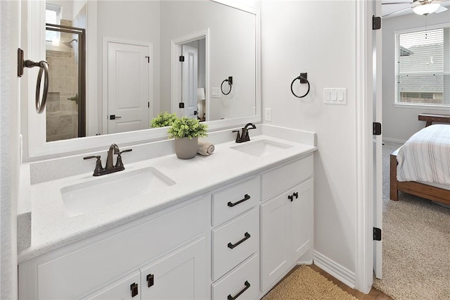 bathroom with vanity and an enclosed shower