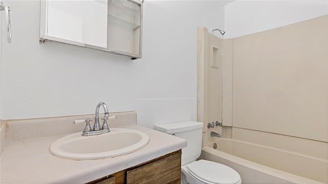 full bathroom with vanity, toilet, and bathing tub / shower combination