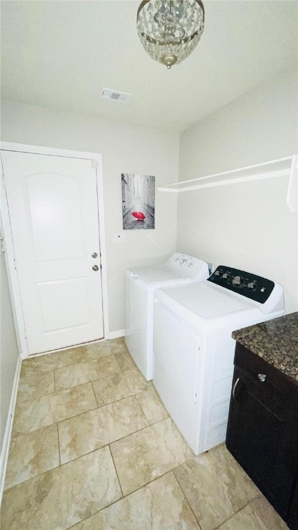 15481 Baker Meadow Loop, College Station, TX 77845 - laundry area with washing machine and clothes dryer, cabinet space, and baseboards