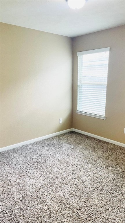 15481 Baker Meadow Loop, College Station, TX 77845 - carpeted spare room featuring baseboards