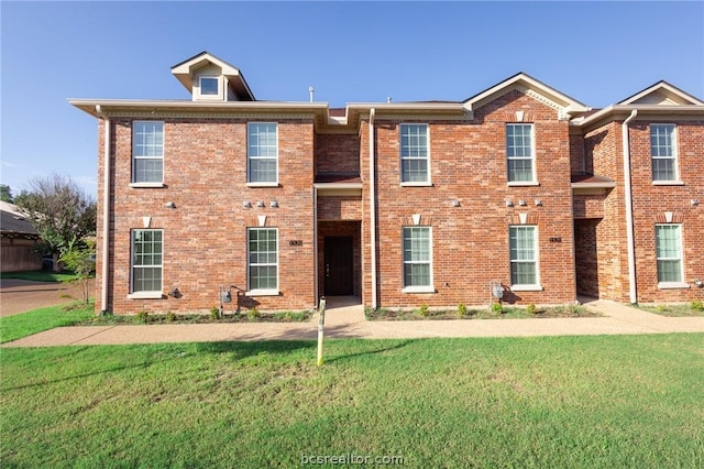 view of front of home with a front yard