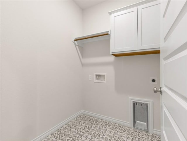 clothes washing area featuring washer hookup, hookup for an electric dryer, and cabinets