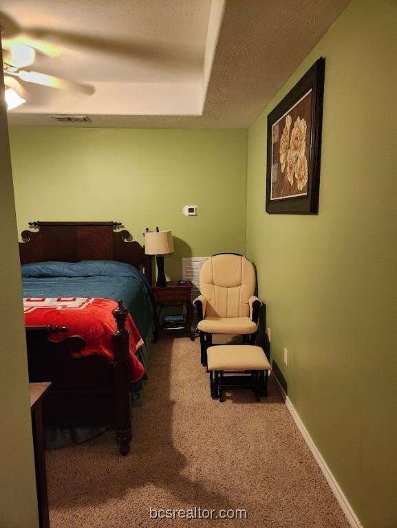 bedroom featuring carpet flooring and ceiling fan