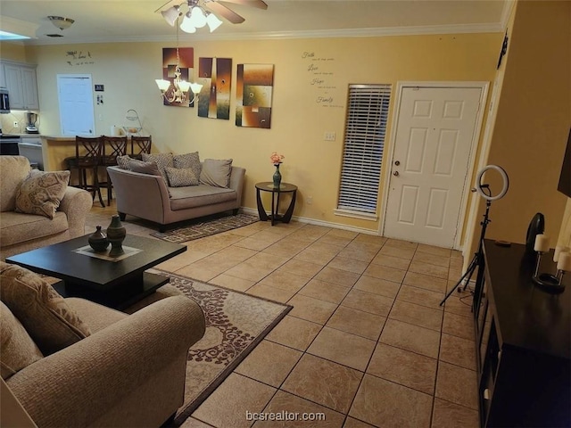 living room with ceiling fan, light tile patterned floors, and ornamental molding