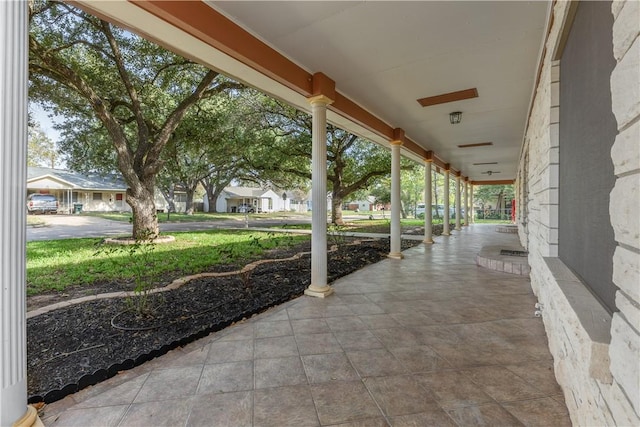 view of patio featuring a porch