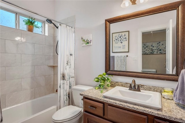 4314 Hadleigh Ln, College Station, TX 77845 - bathroom featuring toilet, vanity, and shower / tub combo