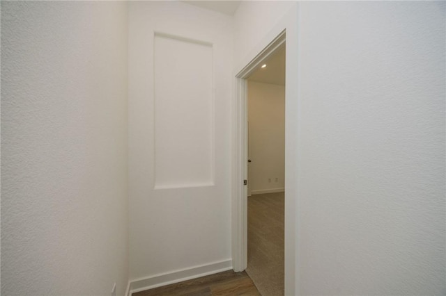 2784 Messenger Way, Bryan, TX 77803 - hallway with dark wood-type flooring and baseboards