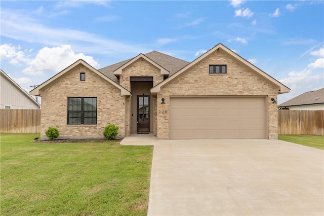 view of front of house featuring fence, concrete driveway, a front lawn, and brick siding