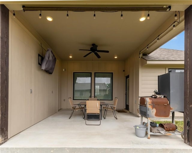 view of patio / terrace featuring outdoor dining area and a ceiling fan