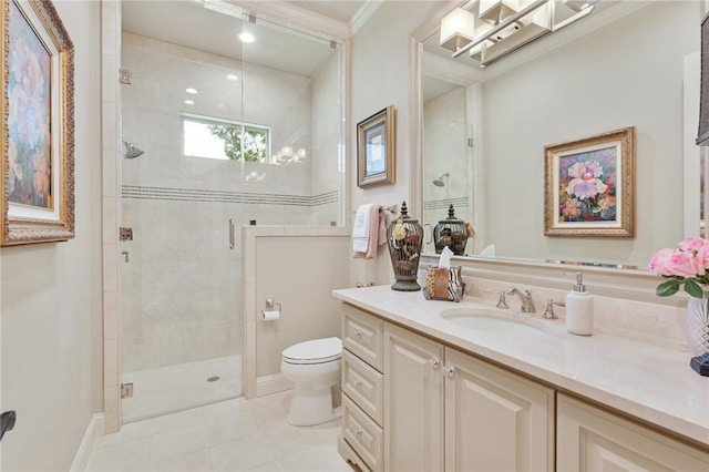 5205 Bourrone Ct, Bryan, TX 77802 - full bath featuring vanity, toilet, a stall shower, tile patterned floors, and baseboards