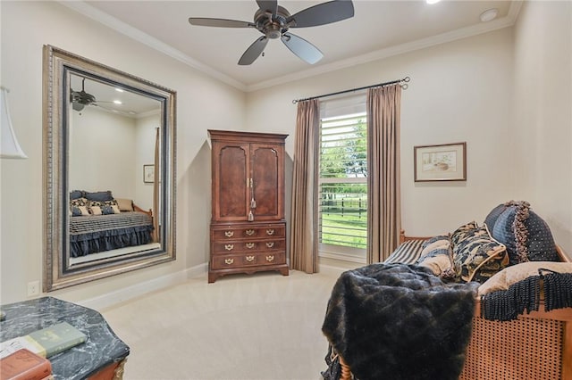 5205 Bourrone Ct, Bryan, TX 77802 - living area with light colored carpet, ceiling fan, crown molding, and baseboards