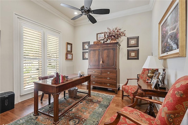5205 Bourrone Ct, Bryan, TX 77802 - home office with ceiling fan, wood finished floors, ornamental molding, baseboards, and recessed lighting