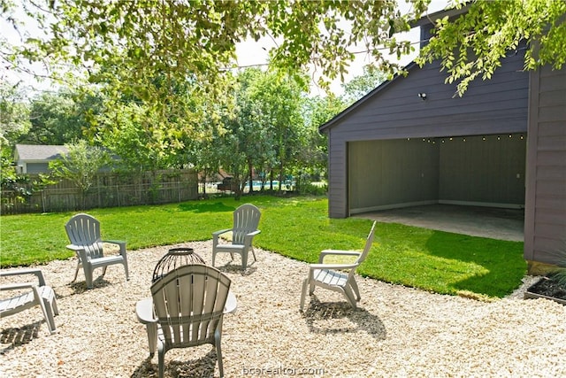 view of patio with an outdoor fire pit