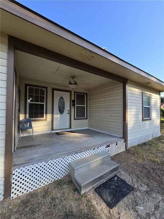 property entrance with covered porch