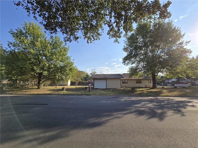 ranch-style home with a garage