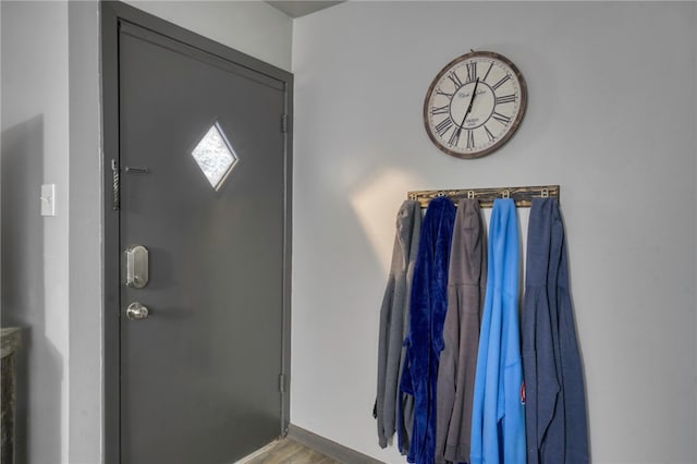 entryway with hardwood / wood-style flooring