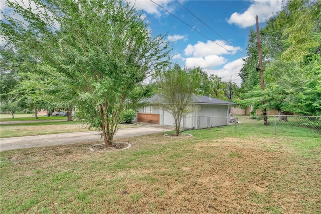 view of yard with a garage