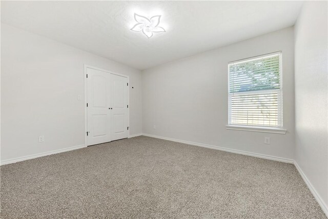 301 S Hutchins St, Bryan, TX 77803 - unfurnished room featuring carpet and baseboards