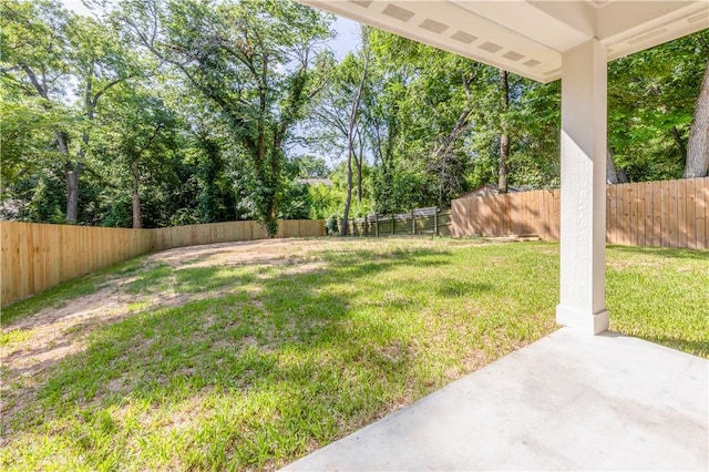 301 S Hutchins St, Bryan, TX 77803 - view of yard featuring a patio and view of scattered trees
