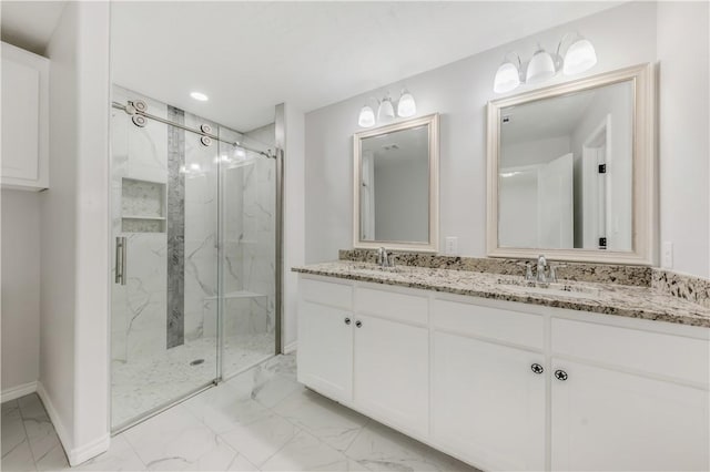 301 S Hutchins St, Bryan, TX 77803 - bathroom with marble look tile flooring, a marble finish shower, baseboards, double vanity, and recessed lighting