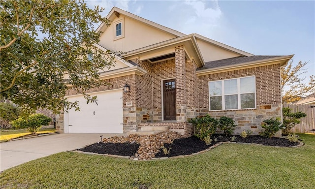 view of front of property featuring a garage and a front yard