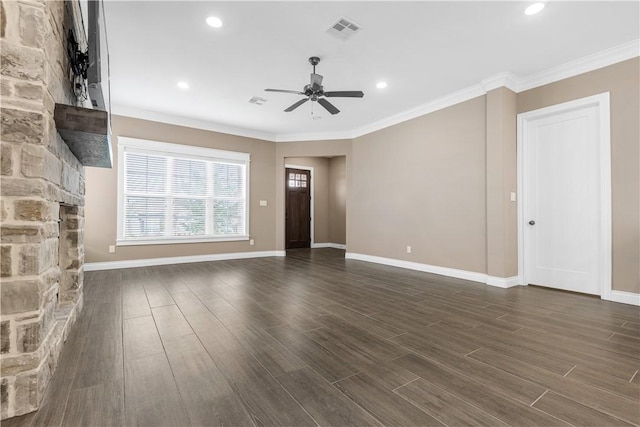 unfurnished living room featuring ceiling fan, a fireplace, ornamental molding, and dark wood-type flooring