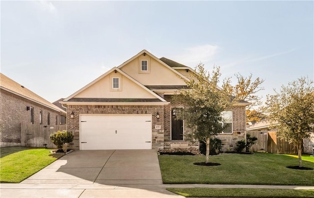 view of front of home with a front yard and a garage