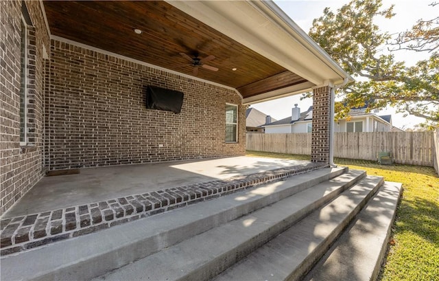 view of patio / terrace featuring ceiling fan